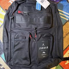 Brand New With Tags. Black School Bag With Zipper Pocket, Black Tote Backpack With Large Capacity, Large Capacity Black Tote Backpack, Black Rectangular Backpack With Zipper Pocket, Black Tote Backpack For Travel, Black Tote Backpack With Zipper Closure, Black Tote-style Backpack For Travel, Black Tote Backpack With Pockets, Black On-the-go Standard Backpack