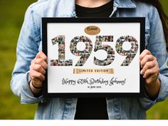 a woman holding up a framed photo with the number twenty nine years printed on it