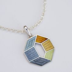 "Necklace also can be combined with the same design earrings https://www.etsy.com/listing/1109652373/grey-yellow-octagon-earrings-cloisonne?ref=shop_home_active_2&frs=1 Weight - 4 gr (approx) Length - 30 mm/1.18\" (including pendant bail) Width - 20 mm/0.78\" Materials: Sterling Silver, Fine Silver, Cloisonne enamel, silver chain 50cm Octagon yellow/grey pendant made from Sterling Silver. 50 cm (20inch) silver cable neck chain with lobster claw closure. Pendant covered with hot cloisonne enamel. Silver Hexagon Necklace For Jewelry Making, Gray Metal Jewelry For Gifts, Gray Metal Jewelry For Gift, Handmade Hexagonal Silver Jewelry, Gray Metal Necklace For Gift, Handmade Gray Metal Jewelry, Gray Pendant Jewelry For Gifts, Gray Pendant Jewelry As A Gift, Crow Jewelry