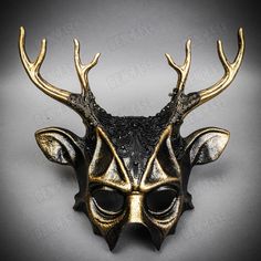 Mystery and allure with our Antler Deer Textured Horn with Laces Devil Halloween Masquerade Mask in Black. Perfect for anyone seeking an unforgettable Halloween costume or masquerade accessory, this mask combines the wild elegance of antler deer horns with the mysterious charm of a masquerade. Crafted from durable plastic, the mask features a textured design that mimics the aged look of antique artifacts, painted in a popcorn-textured black to enhance its appeal. Measuring approximately 14 inches in height and 14 inches in width, this mask is not just a wearable piece but also a statement-making decoration for any wall. Ideal for Halloween festivities, masquerade balls, or as a captivating piece of home decor, this Antler Deer Mask offers a unique blend of the natural and the supernatural. Black Masquerade Party, Antique Artifacts, Masquerade Party Mask, Venetian Costume, Deer Mask, Black Masquerade, Mask Halloween Costume, Costume For Men, Deer Horns