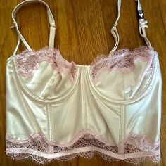 New With Tag On Strap, Never Worn Demi Cups Boning Pink Lace Detail Bows On Straps Adjustable Straps Ivory/Cream Color Size 32c Victoria's Secret Underwire Bra-friendly Tops, Victoria's Secret Fitted Feminine Camisole, Fitted Coquette Top By Victoria's Secret, Victoria's Secret Feminine Bra Friendly Tops, Victoria's Secret Feminine Bra-friendly Tops, Demi Cup, Vs Bras, Unlined Bra, Victoria Secret Sport