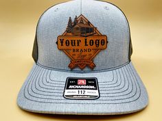 Richardson 112 = Premium structured snapback trucker hats. (structured hats are stiff on top, and formed to shape) Yupoong 6606 = Premium Structured Classic Trucker Custom leather patch hats with Richardson 112 or Yupoong 6606. Great for promoting small business or company To order. Choose what hat brand and color. Send us your logo If you don't have logo, you can choose our template, just let us know what would you like to say on the hat Leather Patch Trucker Hat With Curved Bill, Custom Outdoor Trucker Hat With Leather Patch, Trucker Snapback Hat With Leather Patch, Leather Trucker Hat With Logo Patch, Trucker Hat With Leather Patch, Six-panel, Promote Small Business, Leather Patch Hat, Patch Hats, Patch Hat