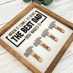 the best dad magnets are displayed in a wooden frame