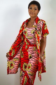 Sold separately from the suit pictured, this African Print Short-Sleeve Kimono Jacket keeps your look on point for any casual occasion. Lightweight and breathable, it's perfect for layering with its open-front style. Pair it over long or short sleeve ensembles, and the below-knee length adds a stylish touch to complete your outfit. African Print Kimono, Short Sleeve Kimono, Print Kimonos, Women's Jacket, Kimono Jacket, Sewing Ideas, Swimwear Tops, African Print, Printed Shorts