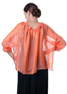 "Gorgeous sheer bolero jacket, with a loose-fitting silhouette is made of finest 100% silk iridescent chiffon in bright coral orange color with delicate rosy shade This short bolero jacket is fully draped, has raglan sleeves and drawstring collar that forms a corolla. This Jacket has loose silhouette. One size fits two. S-M Bust 32-36 inches L-XL: Bust 38-42 inches Fabric: 100% silk iridescent chiffon 6mm Color: #602 Coral Also available in 34 different colors Product images/colors are for refer Spring Silk Chiffon Blouse, Silk Chiffon Blouse For Spring, Spring Orange Silk Top, Orange Silk Top For Spring, Orange Silk Tops For Spring, Orange Silk Blouse For Spring, Summer Long Sleeve Silk Chiffon Tops, Long Sleeve Silk Chiffon Summer Top, Long Sleeve Silk Chiffon Tops For Summer