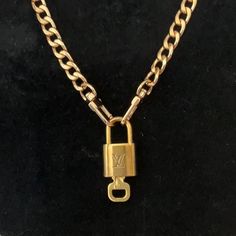 Louis Vuitton Lock And Key # 319 The One That Is Used In All Demonstrations Of The Lock And Key Made In France Louis Vuitton Chain Included Color- Gold Tone 20 Inch Chain Excellent Condition Louis Vuitton Chain, Angel Pendant Necklace, Bright Color Dresses, Louis Vuitton Jewelry, Lock And Key, Vintage Louis Vuitton, Gold Chain Necklace, Chain Choker, Gold Plated Chains