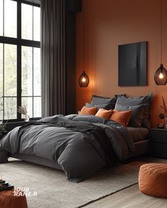 a bedroom with orange walls and grey bedding