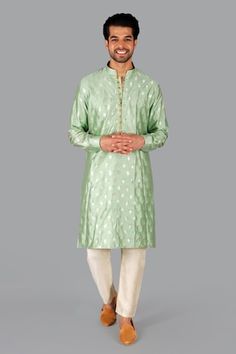 Green banarasi silk kurta with woven floral blossom motifs. Comes with pant. - Aza Fashions Long Sleeve Traditional Wear With Meenakari For Diwali, Long Sleeve Traditional Wear With Meenakari For Eid, Long Sleeve Meenakari Traditional Wear For Eid, Eid Long-sleeve Meenakari Traditional Wear, Eid Meenakari Long Sleeve Traditional Wear, Diwali Straight Kurta With Meenakari Details, Diwali Meenakari Straight Kurta, Festive Straight Kurta With Meenakari Detailing, Elegant Meenakari Kurta For Diwali