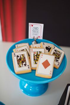 a blue plate with playing cards on it