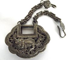 see my Shop for more listings like this :) https://beadbarista.etsy.com Antique Chinese Qing Silver Filigree Foo dog lion Bat Lock w/ chain A fine antique large Chinese Qing Lock ready for a necklace. This silver filigree is made of Chinese silver (which can have a large variation of silver) and it tests somewhere between sterling silver and coin silver, (more towards coin silver than sterling). The filigree work is very detailed, it is a quality Chinese piece. The Foo dog or lion is so well don Chinese Symbols, Foo Dog, Silver Filigree, Pendant Necklaces, Jewelry Necklace Pendant, Bat, Lion, Coin, Jewelry Necklaces