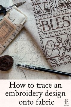 an embroidery project with scissors and thread on the table next to it is text that reads how to trace an embroidery design onto fabric