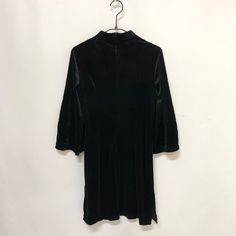 A Chinese dress made of velour material with an embroidered design.

 There is a zip on the back for easy removal.



・Shoulder width 34cm

 Width: 41.5cm

 Length: 84cm

 Sleeve length: 41cm

 standard

 ■ Country of Origin: China

 ■Material: 90% polyester

 10% Polyurethane



 Notes

 ■About size

 Actual dimensions are measured when laid flat. Please note that there may be slight differences depending on the material.


 
■About color

 Please note that the colours of the actual product ma Winter Mini Velvet Dress, Mini Velvet Dresses For Fall, Black Velvet Mini Dress For Fall, Black Velvet Knee-length Dress, Velvet Knee-length Mini Dress For Night Out, Black Fitted Knee-length Velvet Dress, Mini Tight Dress, Vision Street Wear, Tight Mini Dress