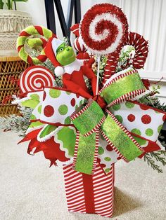 a christmas decoration with candy canes and candies