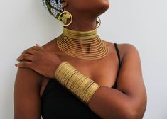 African Brass necklace, Brass Choker Necklace, Statement Necklace, Brass jewelry, One size fits all, Christmas Gift for her, Moms gift The necklace is handmade using brass wire The necklace is adjustable hence can fit any neck size. The brass jewelry set includes: Necklace, earrings and 2 bracelets Please select your style shown Shipping fee is for the first item only, additional items ship for FREE. DHL Express shipping with 3-5 days delivery. To view our brass collection, click here: https://www.etsy.com/shop/NkoroiCrafts?ref=simple-shop-header-name&listing_id=1295061994&section_id=39639351 *Care instructions* Brass tarnishes with exposure to moisture and oxidation. To clean it, kindly use a lemon wedge. Squeeze the juice and polish along the surface with a clean cloth. Adjustable Metal Jewelry Sets As Gifts, Unique Adjustable Jewelry Sets As Gifts, Adjustable Costume Jewelry Choker As Gift, Adjustable Costume Jewelry Choker For Gift, Handmade Adjustable Gold Jewelry Sets, Unique Choker Jewelry For Gifts, Unique Choker Style Jewelry Gift, Brass Choker Jewelry As Gift, Metal Choker Jewelry Set As Gift