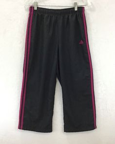 Thank-You SO MUCH For Supporting Small Business =) Adidas / Athleisure Crop Capri Athletic Pants Elastic Waist / Mesh Lined Fabric: 100% Polyester Waist is About 27" / Rise is About 10" / Inseam is About 21" Color: Black / Fuchsia Women's Size: S / Because Sizing Varies, and Often Washing Clothing May Change the Sizing, Please Compare the Actual Measurements Above to Those of Your Current Favorite Crop Athletic Pants, to Ensure a Great Fit Item #: D26-4 Top USA Seller / FAST SHIPPING! / I Absolu Adidas Cotton Sweatpants For Gym, Adidas Cotton Gym Pants, Adidas Stretch Sweatpants For Workout, Adidas Casual Workout Pants, Casual Adidas Workout Pants, Adidas Cotton Gym Bottoms, Adidas Athleisure Workout Pants, Adidas Pink Sports Pants, Sporty Capri Length Pants For Sports