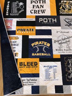 a quilt made to look like it has many different logos on it