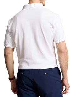 An American style standard since 1972, the Polo shirt has been imitated but never matched. Over the decades, Ralph Lauren has reimagined his signature style in a wide array of colors and fits, yet all retain the quality and attention to detail of the iconic original. This version is made of highly breathable cotton mesh, which offers a textured look and a soft feel, and is finished with the beloved Polo Bear.​​100% cotton Ribbed-knit collar2-button placketPolo Bear and "Polo" embroidered at the White Fitted Polo Shirt With Spread Collar, Classic White Crew Neck Polo Shirt, Classic White Polo Collar Shirt, White Unstructured Cotton Camp Shirt, Unstructured White Cotton Camp Shirt, White Fitted Top With Johnny Collar, Unstructured Collared White Top, Unstructured White Collared Top, Classic White Relaxed Fit Polo Shirt