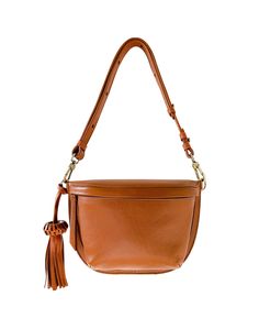 The Fem fanny bag crafted of high quality genuine leather, offers a fashion-forward hands-free option to keep essentials secure and right at your fingertips. The streamlined design includes an adjustable strap that can be worn three ways: fanny bag, crossbody or shoulder bag. The tassel is removable, if it's not your thing. Versatile Leather Crossbody Belt Bag, Versatile Leather Belt Bag With Detachable Strap, Everyday Top Handle Belt Bag With Detachable Strap, Leather Crossbody Belt Bag With Adjustable Strap, Versatile Leather Belt Bag As Shoulder Bag, Versatile Leather Shoulder Belt Bag, Daily Use Belt Bag With Adjustable Strap, Belt Bag With Adjustable Strap And Top Handle, Everyday Belt Bag With Top Handle And Adjustable Strap