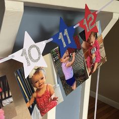 a photo collage with pictures of babies and stars hanging from clothes pins on a string