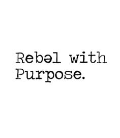 a black and white photo with the words rebel with purpose