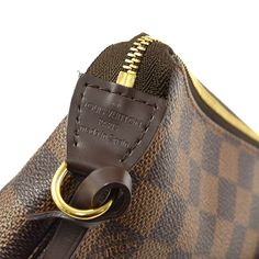 Elevate your style with the iconic Louis Vuitton Damier Pochette Accessoires Handbag. Crafted from the luxurious Damier Ebene canvas, this compact yet versatile handbag is perfect for day-to-night transitions. The sleek design is accentuated by the signature LV engraved gold-tone hardware, adding a touch of sophistication to any outfit. With its detachable leather strap, this handbag can be as a clutch or a shoulder bag, making it a must-have accessory for the modern fashionista. Add a touch of Elegant Monogram Canvas Bag With Zipper Closure, Elegant Monogram Canvas Bag With Zipper, Luxury Pouch With Detachable Strap, Elegant Monogram Canvas Shoulder Bag With Zipper Closure, Elegant Monogram Canvas Shoulder Bag With Zipper, Business Bags With Zipper In Monogram Canvas, Classic Monogram Canvas Pouch For Everyday Use, Luxury Monogram Canvas Pouch For Everyday Use, Luxury Pouch Shoulder Bag With Zipper Pocket