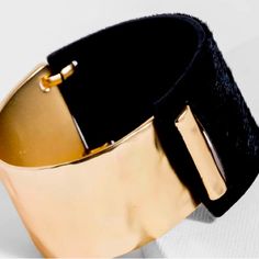 Cuff Bracelet Features A Thick Leather Band With Calf Hair And A Metal Accent Piece That Is Reminiscent Of Textured, Bold Modern Art. A Statement Piece That Can Easily Be Worn Day To Night, And In Every Season. Materials: Zinc Alloy, Leather, Interlocking Closure Chic Cuff Bracelets For Party, Chic Cuff Bracelet For Party, Formal Jewelry With Adjustable Black Band, Elegant Gold Bracelet With Black Band, Adjustable Bracelets With Black Band For Party, Elegant Adjustable Cuff Bracelet With Black Band, Adjustable Black Band Bracelet For Party, Adjustable Black Band Bracelets For Party, Trendy Black Cuff Leather Bracelet