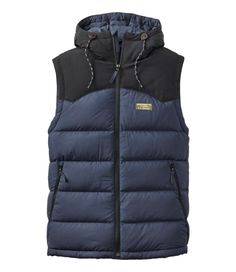 Classic, warmth and versatile: our popular Mountain Classic Down Vest now comes in a hooded style for extra comfort. Best with midweight layer. Slightly Fitted. Falls at hip. PFC/PFAS-free durable water repellent (DWR). Piecing at shoulders and hood: 100% nylon. Shell: 100% recycled polyester ripstop fabric. Lining: 100% recycled polyester. Machine wash and dry. Weight: 1. 25 lbs. Hooded: Yes, attached hood with classic pulls Insulation: 650-fill DownTek™ water-repellent down Water Resistant: Ye Casual Hooded Jacket With Padded Collar For Outdoor Activities, Casual Hooded Jacket With Padded Collar For Outdoor, Midweight Hiking Outerwear With Drawstring Hood, Winter Midweight Hooded Jacket With Double-lined Hood, Midweight Winter Hooded Jacket With Double-lined Hood, Navy Nylon Outerwear For Outdoor, Fitted Outdoor Hooded Jacket With Double-lined Hood, Navy Outerwear With Padded Collar For Outdoor, Fitted Hooded Jacket With Detachable Hood For Outdoor