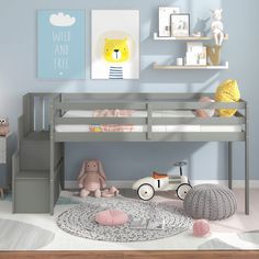 a child's bedroom with a bunk bed, toys and pictures on the wall