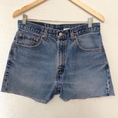 "Size 31 Vintage Levis 505 Cutoff Shorts Jeans High Waisted Distressed Light Wash Blue Denim Shorts Mom Girlfriend Jeans Boyfriends Jeans Cutoffs Short Jeans Made In Mexico Waist 31\" Brand: LEVIS 505  Size on tag: W33 Fits like 31\" waist, 12.5\" rise, 25.5\" thighs, 42.5\" hips, 2.5\" inseam,! Fits a size 31, but check your measurements and compares the measurement with your garment. (see full measurement below) Recommended waist size: 31\" Material :  Cotton 100% Made In Mexico NOT YOUR SIZE? Medium Wash Cutoff Jean Shorts With Belt Loops, Medium Wash Cutoff Shorts With Belt Loops, Vintage Medium Wash Relaxed Fit Shorts, Vintage Jean Shorts With Belt Loops For Summer, Relaxed Fit Cutoff Jean Shorts With Belt Loops, Vintage Mid-rise Jean Shorts With Built-in Shorts, 90s Style Frayed Hem Cutoff Jean Shorts, 90s Distressed Cutoff Bottoms, 90s Relaxed Fit Cutoff Jean Shorts