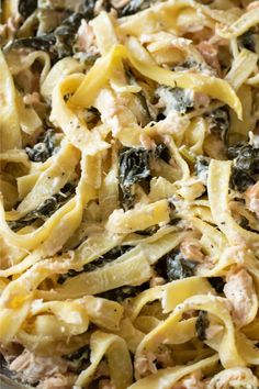 pasta with tuna and spinach in a pan