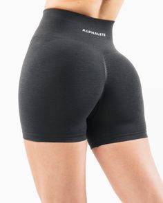 HIGHLIGHTS. High-waisted short. Form-fitting with an integral 3-tiered, tapered waistband. Seamless, knit fabric. No front seam. Back scrunch seam detail to enhance curves. Leg and glute contouring panels. 4.5” inseam. Alphalete wordmark logo branding knitted in white FIT SUGGESTION. This item runs true to Alphalete’s standard seamless fit.. If you are between sizes, we recommend sizing up.. Model is 5’3”/160cm, wearing a size S with a 25.5”/64.7cm waist and 35”/88.9cm hips. MATERIALS AND WASHIN Hot Pink Shorts, Wordmark Logo, Wrap Shorts, Womens Bras, Shorts Athletic, Drawstring Shorts, Grey Shorts, Bottom Clothes, Bra Set