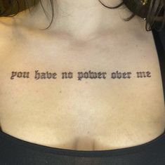 a woman's chest with the words you have no power over me tattooed on it