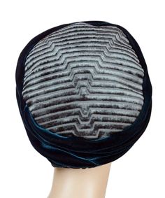 THE ANA, handmade in Seattle, WA, USA, is a charming 1920's cloche style, bias cut hat. This hat is shown in Chenille in Bonsai Upholstery Fabric with Black Velvet. That hat is shown with Black With Teal Fathers (Trim 92). The rolled brim is 3 1/2" at center front and 1 1/2" at center back. The crown height is folded into 4" with a crown diameter of 8". The brim folds over a ruched panel of velvet. Prices are as shown. These pieces are made-to-order and may be exchanged or returned for a store c Crown Heights, Hat Style, Cloche Hat, Custom Hats, The Crown, Hat Fashion, Black Velvet, Upholstery Fabric, Color Matching