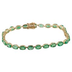 Elevate your ensemble with this exquisite 14K Yellow Gold Bracelet featuring a breathtaking 10.40 Carat Faceted Oval Emerald, radiating timeless beauty and sophistication. Specifications: * Metal Type: 14K Yellow Gold * Gemstone: * Emerald * Carat Weight: 10.40 * Stone Count: 26 * Stone Shape: Faceted, Oval * Stone Color: Green * Type/Clarity: Slightly Included, Moderately Included * Estimated item measurements: * Inside Circumference: 7" * Width: 0.25" * Marks: 14K, Designer Signature * Total Item Weight: 7.7 grams * SKU: 9QBR-1E * Stock ID: BRACE124212 Crafted with precision and finesse, this bracelet is designed to captivate attention and enhance any outfit. The mesmerizing green hue of the emerald, paired with the lustrous 14K yellow gold setting, creates a stunning combination that ex Yellow Gold Setting, Yellow Gold Bracelet, Everyday Accessories, Oval Stone, Link Bracelets, Timeless Beauty, Types Of Metal, Stone Color, Jewelry Pieces