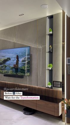 a large flat screen tv mounted to the side of a wall in a living room