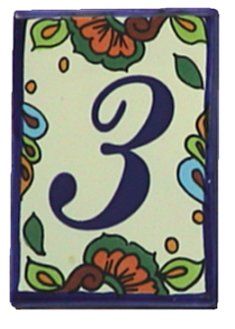 the number five is decorated with flowers and leaves