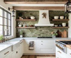 a kitchen with white cabinets and open shelving above the stove, surrounded by wooden shelves