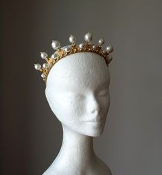 This crown is made to order and ready to ship by 3-4 week Large pearl crown, Gold bridal tiara, Wedding pearl crown ~MATERIALS~ -Czech glass white clear crystals -Japanese cotton pearls -Gold filigree ~SIZE~ Size of pearls - 12, 14 18 mm, height 1 1/2 inches ~SHIPPING AND DELIVERY TIME~ This headpiece is ready to ship by 3-4 week The approximate time of shipment: - 10-16 days to Europe - 15-35 days to United States and other countries. ~IMPORTANT INFORMATION~ -Please allow as much time for shipp Bridal Pearl Headband, Pearl Tiara Wedding, Tiara Gold, Pearl Crown, Pearl Bridal Headband, Pearl Tiara, Gold Tiara, Crown Wedding, Hair Adornments