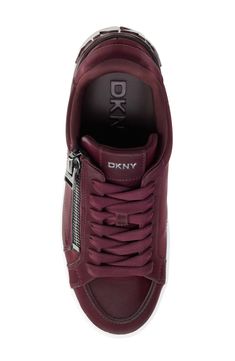 A side zipper adds a flash of edge to a street-chic mid-rise sneaker complete with logo lettering at the heel. Lace-up style; side zip closure Removable, cushioned insole with arch support Synthetic upper/textile and leather lining/synthetic sole Imported Trendy High-top Sneakers With Zipper Closure, Trendy Lace-up Sneakers With Zipper Closure, Sporty High-top Sneakers With Zipper Closure, Sporty High-top Sneakers With Zipper, Sporty Leather High-top Sneakers With Zipper, Sporty High-top Sneakers With Zipper For Streetwear, Sporty Leather Sneakers With Zipper Closure, Leather Sneakers With Zipper For Streetwear, Sporty Sneakers With Zipper Closure For Streetwear