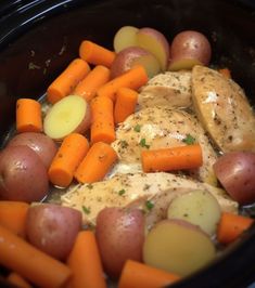 chicken, potatoes and carrots in a slow cooker