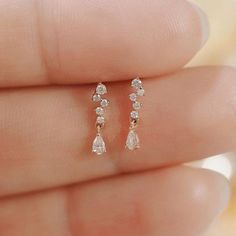 ✰ We send these pear cut diamond earrings with 100% safe Alpa system clips. Secure clips for bad events such as falling, getting lost. These clips are also 14K and 18K gold. We have thought of everything for you. You just choose what's best for you! Drop Diamond Gold Dangle Earrings PAIR EARRINGS ✰ Total Diamonds: 0.36 Carat ✰ Pear Diamonds: 0.24 Carat ✰ Round Diamonds: 0.12 Carat ✰ Diamonds Clarity: SI F ✰ Pear Diamond Size: Length 4.2 mm. Width 2.8 mm. ✰ 14K Solid Gold ✰ Rose Gold | White Gold Small Elegant Earrings, Teardrop Diamond Earrings, Simple Drop Earrings, Diamond Drop Earrings Simple, Dimond Earrings, Elegant Earrings Classy, Everyday Diamond Earrings, Minimalist Accessories Jewellery, Pear Diamond Earrings