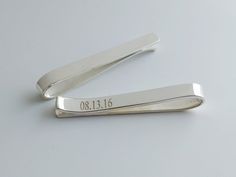 "Personalized Hidden Message Tie Clip,Back Side Engraving Tie Clip,Wedding Date Tie Clip, Blank Tie Clip,Tie Clip for Best Man,Groom Tie Clip This personalized Latitude longitude tie clip make wonderful gift for the men in your life. It's handmade with love and care. This tie clip can be designed with any words, names, initials,roman numeral coordinates,symbols and etc. Please contact me with any questions. I am happy to help you create your perfect tie clip! Detail Material:925 sterling sliver Groom Tie, Wedding Cuff Links, Wedding Cuff, Groom Ties, Latitude Longitude, Hidden Message, Cufflinks Wedding, Roman Numeral, Wedding Date