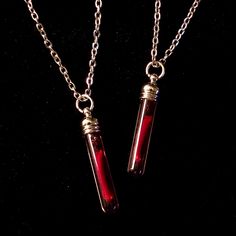 A gothic blood vial pendant made with ethically sourced rodent bones, encased in blood red resin.  Each one is handmade, therefore may have minor differences due to the nature of the material. Blood Vile Necklace, Blood Necklaces, Blood Vial Necklace, Blood Necklace, Pearl Necklace Outfit, Vial Pendant, Vial Necklace, Blood And Bone, Film Props