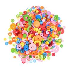 a pile of colorful buttons on a white background