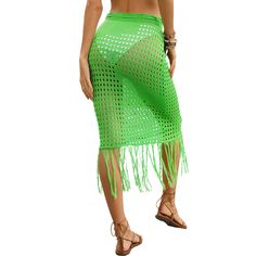 Green Hollow-out Tasseled Beach Cover Skirt Summer Beach Party Bottoms With Tassels, Beachwear Bottoms With Tassels For Beach Party, Beach Party Bottoms With Tassels, Green Beachwear Skirt For Summer, Bohemian Green Beach Skirt, Bohemian Green Skirt For The Beach, Green Beach Skirt For Summer, Green Summer Beach Skirt, Green Summer Skirt For The Beach