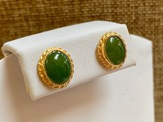 Welcome To Gold Knox Beautiful vintage 12K yellow gold filled and green cabochon jade stud earring set Great gift for any occasion. Details below: Materials 12K yellow gold, jade Hallmark 12K G.F. This would make great addition to your vintage collection. Thank you for looking Gold Knox opened its storefront in Pasadena, CA in 2011, since then we have an online store on eBay, and we joined Etsy in 2016 where we offer our unique and desirable items for you. Most all our items are vintage they are Yellow Gold Jade Jewelry With Cabochon, Vintage Yellow Gold Cabochons As Gift, Vintage Yellow Gold Cabochons For Gift, Classic Gold Cabochons For Gifts, Elegant Green Cabochons For Gifts, Elegant Green Cabochons As Gifts, Classic Jade Jewelry With Matching Earrings, Vintage Jade Round Earrings, Oval Cabochon Clip-on Jewelry As Gift