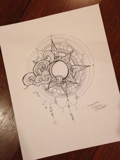 a drawing of the sun and stars on paper