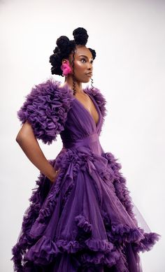 A masterpiece of ethereal elegance, the Dream Weaver dress is a vision in rich purple tulle. Its intricate layers of ruffles flow gracefully from the bodice, creating a mesmerizing effect that evokes a sense of enchantment. Crafted from high-quality tulle, this dress offers a soft and luxurious feel against the skin. The deep V-neckline adds a touch of sensuality and charm. The puffed sleeves provide a playful and feminine touch. It has a back zipper closure. The gown is designed to flatter the figure with a comfortable and flattering fit. CARE INSTRUCTIONS 𐙚 Hand wash cold 𐙚 Air dry on a hanger 𐙚 Avoid bleach and harsh detergents 𐙚 Steam on low heat, if necessary Ethereal Elegance, Purple Tulle, Dream Weaver, Rich Purple, Cold Air, Puffed Sleeves, Tea Length, British Indian, The Dream