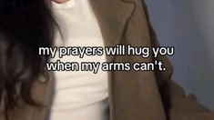 a woman in white shirt and brown jacket with text on it that reads, my prayer will hug you when my arms can't