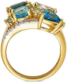 Brilliant blue topaz come together to create this stunning statement ring. Macy's Oval Jewelry With Prong Setting, Macy's Fine Jewelry Rings With Accent Stones, Macy's Formal Jewelry Ring, Blue Macy's Jewelry For Wedding, Macy's Blue Wedding Jewelry, Fine Jewelry Blue Topaz Cluster, Fine Jewelry With Accent Stones In Cluster Shape, Fine Jewelry With Cluster Accent Stones, Pear-shaped Blue Topaz Yellow Gold Jewelry